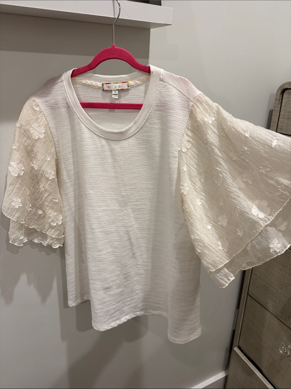 White shirt with sheer sleeve caps